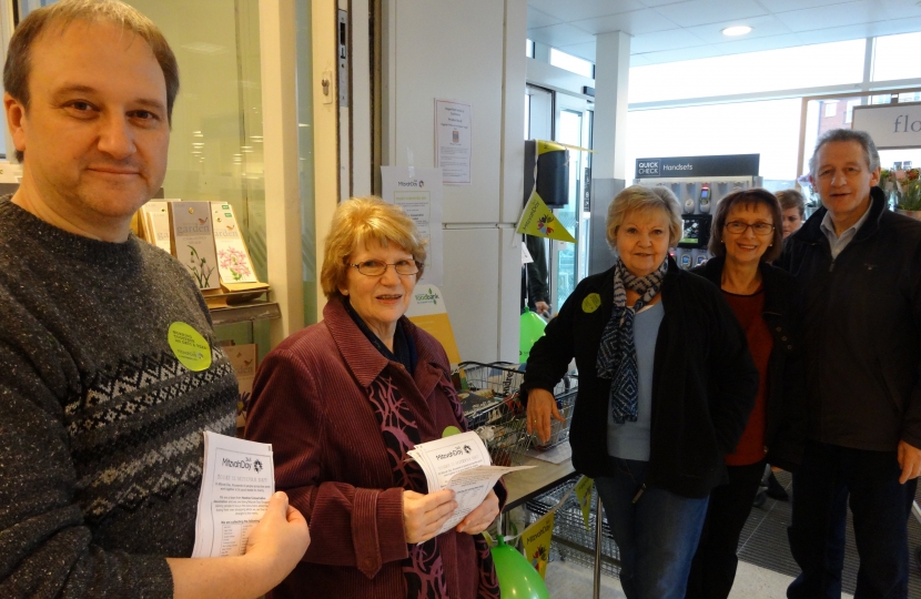 Local councillors and members helping on the Mitzvah Day stall